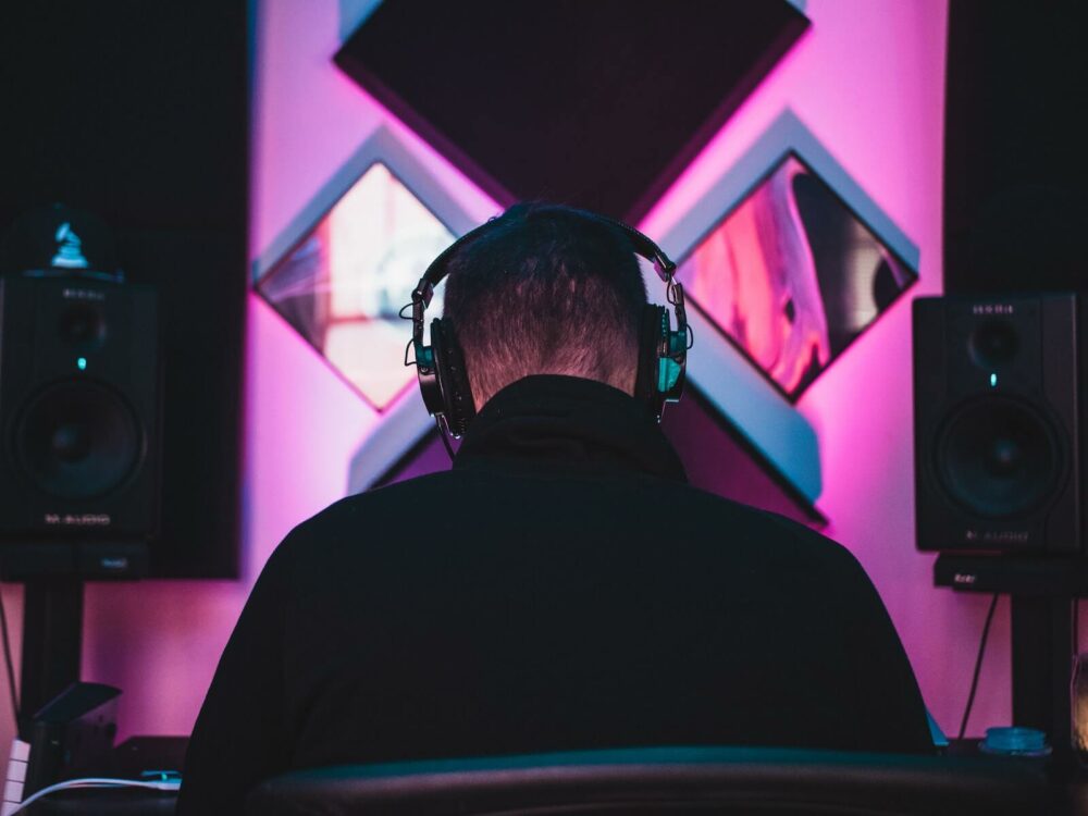why do musicians wear headphones - communicate with recording team
